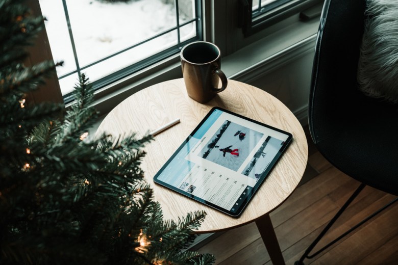 Scene of end-of-year journaling prompts being answered on tablet in the Day One app