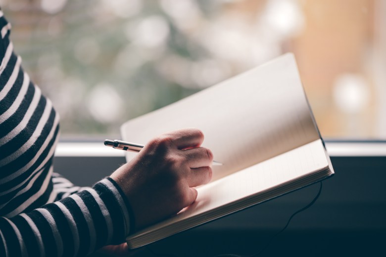 a person writes in their journal