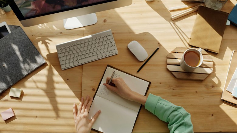 a scene of journaling using journal prompts