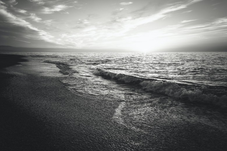 A photo of waves as a metaphor for journaling grief 