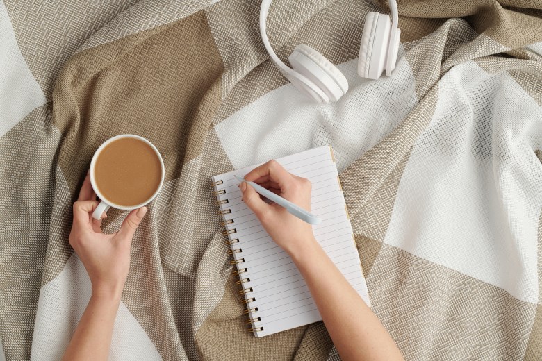 A person uses music journaling as a February journaling idea