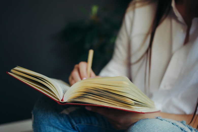 a person practices self-awareness through journaling